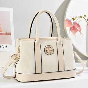 Minimalist beige tote bag with marble texture, gold logo and adjustable shoulder strap