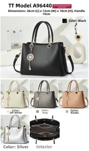 Detail view of large capacity tote bag with grain leather and metal handle
