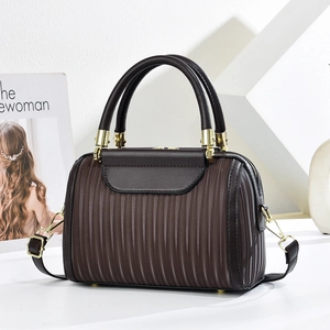 Dark brown textured Boston bag with pleated details and elegant golden hardware