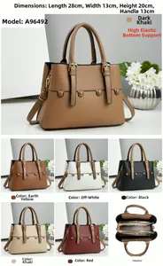 Detail view of large capacity crossbody bag interior with three-compartment storage design