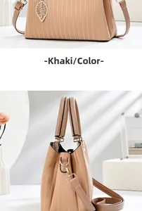 Détail du sac cabas kaki avec texture plissée et pendentif feuille en décor maison