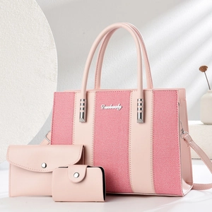 Pink 3-in-1 handbag set featuring striped patchwork tote, flap wallet and card holder