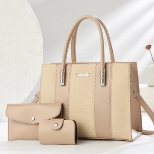 Three-piece beige patchwork tote bag set with matching clutch and card holder