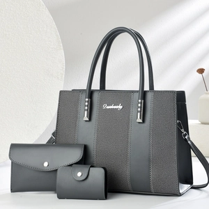 Three-piece dark grey minimalist tote bag set with detachable shoulder strap and hardware