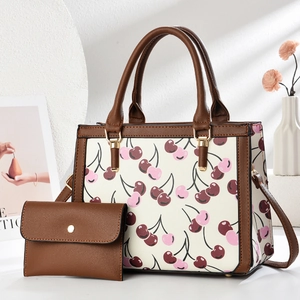 Chic cherry print tote bag set with brown leather trim and matching coin purse