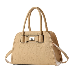Beige faux leather handbag with embossed heart texture and bow decoration for women