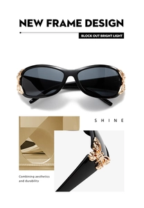 Detailed view of luxury oversized sunglasses featuring gold butterfly metal accents on temples