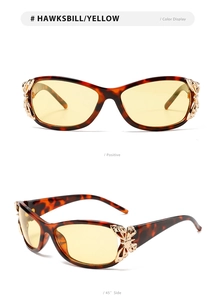 Detail of tortoiseshell sunglasses with golden butterfly hinge and yellow lenses