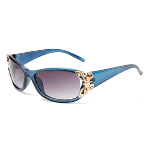 Women's butterfly sunglasses with blue transparent frames and gradient lenses
