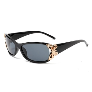 Fashionable black sunglasses for women with elegant golden butterfly metal decorative hinges