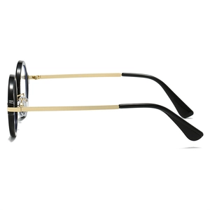 Vue latérale de lunettes rétro rondes à monture noire avec fines branches en métal doré