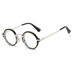 Détail de lunettes anti-lumière bleue rondes avec monture rétro en métal noir et argenté