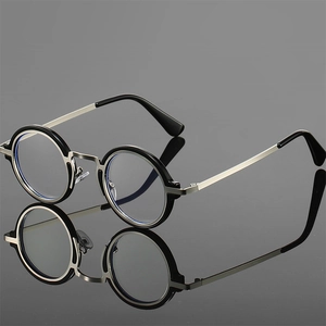 Lunettes anti-lumière bleue rondes rétro avec monture en métal noir et reflet élégant