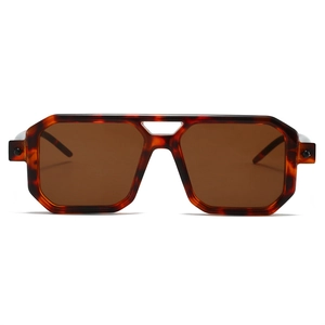 Detail of tortoise shell square sunglasses with double bridge and brown lenses