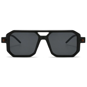 Detail of square black sunglasses with double-bridge frame and metallic rivets
