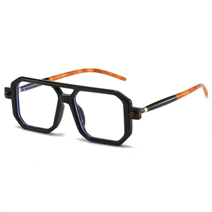 Detail of square black frame glasses with double bridge and tortoiseshell temple tips
