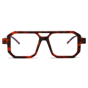 Detail view of tortoiseshell geometric eyeglasses frame with classic double bridge design