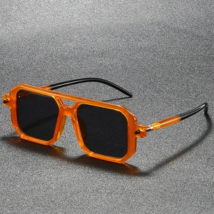 Retro square sunglasses with orange translucent frames and dark tinted lenses