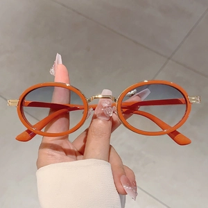 Lunettes de soleil steampunk rétro à monture ovale orange et verres dégradés tendance
