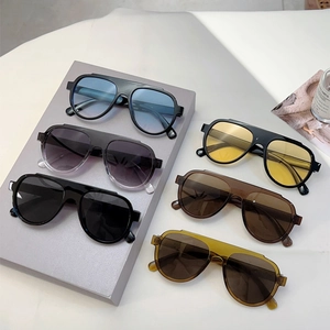Set of 6 vintage oversized aviator sunglasses with multi-colored lenses and thick frames