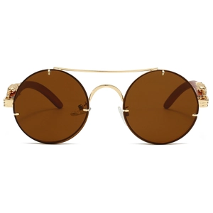 Detailed close-up of golden leopard head hinge and wood grain temples on round sunglasses