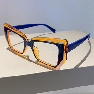 Close-up of geometric blue and amber contrast frame blue light blocking glasses