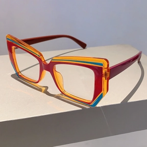 Detailed view of irregular geometric multicolor acetate frame with blue light blocking lenses