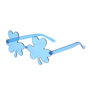 Detailed view of blue clover-shaped shamrock party sunglasses for St. Patrick's Day