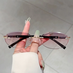 Fashion rimless oval sunglasses with purple gradient lenses and gold metal temples
