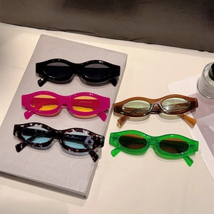 Chic oval sunglasses collection in diverse colors for a retro outdoor fashion look