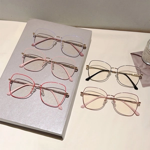 Five assorted metal frame anti-blue light glasses in square shapes and trendy colors