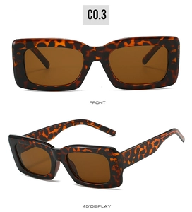Macro view of retro tortoise shell rectangular sunglasses with wide temples