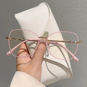 Pink metal frame anti-blue light glasses with gold spring legs and leather case