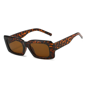 Vintage tortoiseshell rectangular sunglasses with brown lenses shown in a 45-degree view