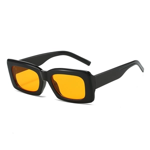 Retro rectangle sunglasses with thick black frames and orange tinted lenses in white background