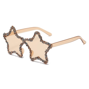 Star-shaped sunglasses with sparkling rhinestones and translucent brown lenses