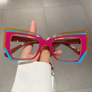 Gafas de ojo de gato multicolores con filtro de luz azul y montura vibrante rosa y ámbar