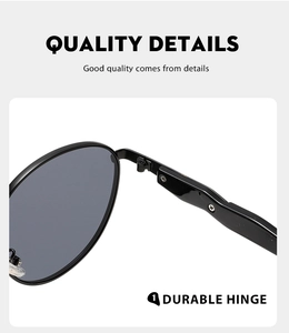 Detail of durable hinge and matte black metal frame on quality round sunglasses