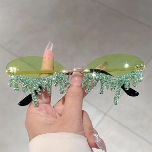 Frameless rimless sunglasses with green lenses and sparkling teardrop rhinestone charms