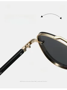 Macro detail of gold-engraved V-pattern frames and durable metal hinges on aviator sunglasses