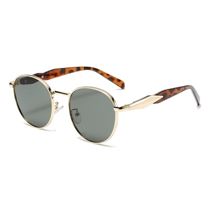 Retro round metal frame sunglasses with gold finish and dark polarized lenses