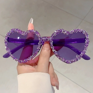 Fashionable heart-shaped purple sunglasses with sparkling rhinestones for party wear