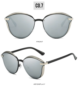 Vue de face et de profil à 45 degrés de lunettes de soleil vintage à monture métallique