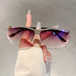 Frameless flame shaped sunglasses with purple gradient lenses and silver metal frame