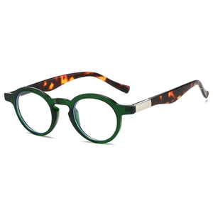 Retro round frame glasses with translucent green front and tortoiseshell temples