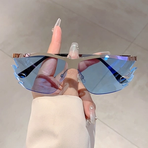 Fashionable rimless flame-shaped sunglasses with blue lenses and silver metal bridge