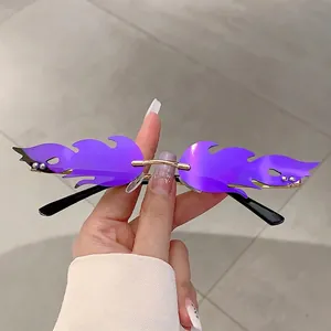 Fashionable purple flame rimless sunglasses with gold metal frame and bead accents