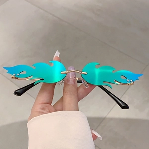 Frameless flame-shaped sunglasses with blue gradient lenses and gold metal frames