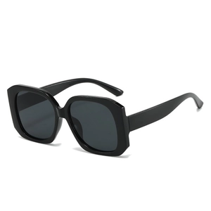 Chic black oversized square sunglasses with thick geometric frames for a retro fashion look