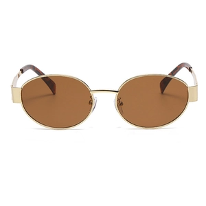 Detail of gold oval frame sunglasses with brown lenses and tortoiseshell temple tips